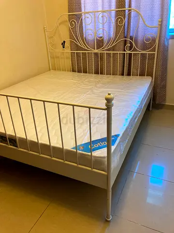 Steel king size bed with mattress 250 dhs
