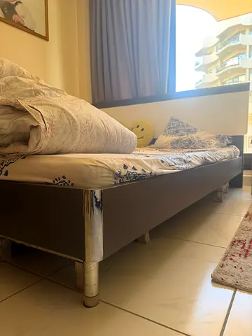 King-size wooden bed frame