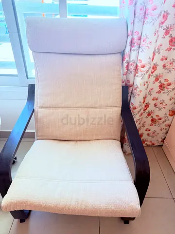 IKEA Beige Upholstered Armchair with Dark Wood Frame