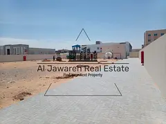 For Annual Rent | Yard with Two Brand-New Warehouses in New Industrial Area, Umm Al Quwain Property