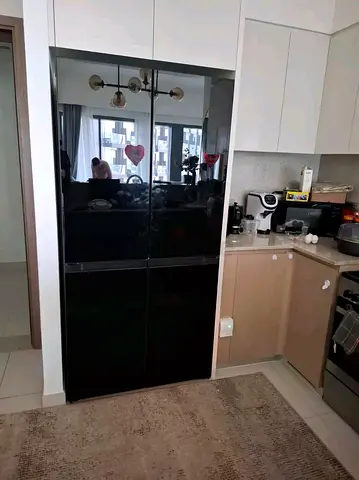 Hitachi Black four-door refrigerator in excellent working condition
