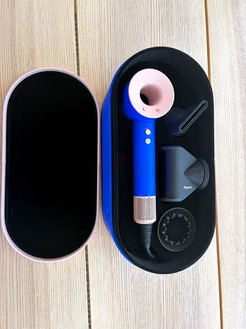 Dyson Supersonic hair dryer with attachments in travel case - blue