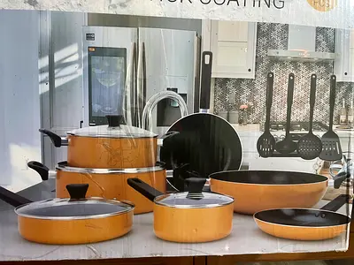 12 piece cookware set with spoon (new condition)