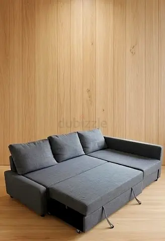 Grey L-shaped Sofa Bed with Storage — Good Condition