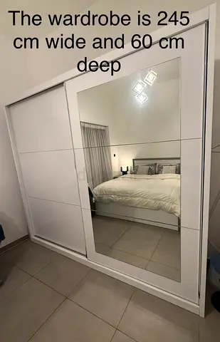 White Sliding Door Wardrobe with Large Mirror — 245cm W x 60cm D