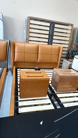 Available high quality bed with tow side table like new