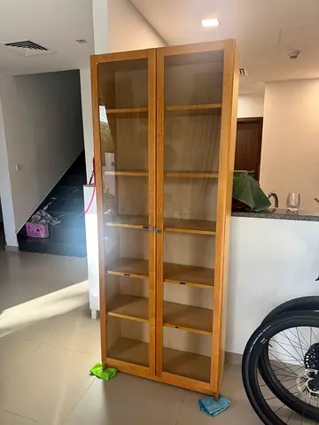 Wooden cabinet with glass doors