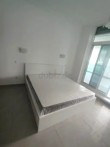 ikea malm king bed with ikea firm mattress   having 2 storage units under the bed