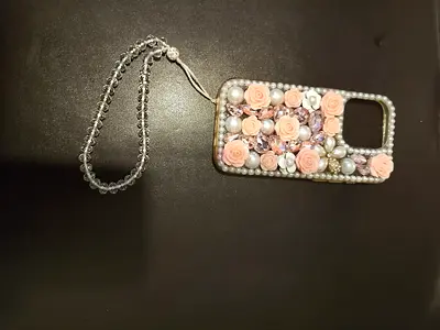 Handmade pink floral beaded iPhone case with strap