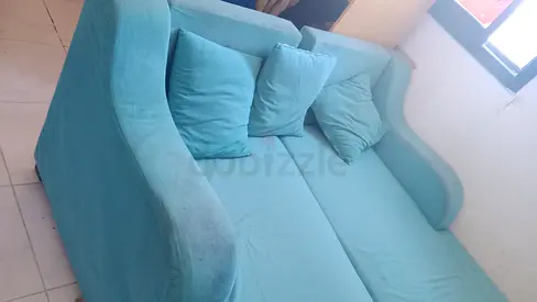 Light blue 3-seater sofa cum bed with cushions - good condition