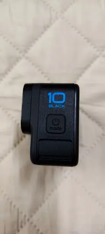 GoPro HERO10 Black action camera (used) with some accessories