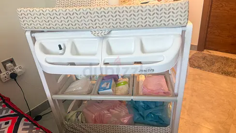 Baby changing table with storage and changing pad