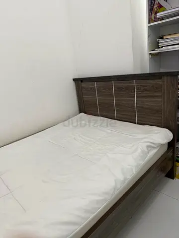 Single wooden bed frame without mattress