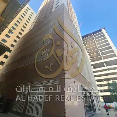 For Sale in Sharjah – Al Nahda Area | Residential + Commercial Building | 90 Apartments (60 – 2 Bedrooms + Hall / 30 – 1 Bedroom + Hall) + 3 Shops + 9