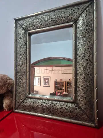 Metallic ornate mirror