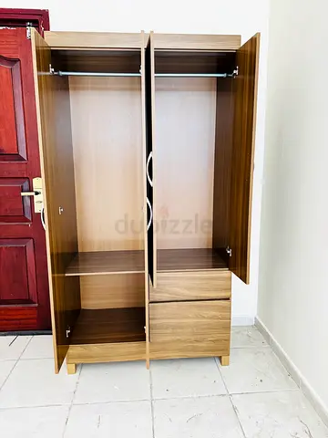 Two-door wooden wardrobe with drawers - good condition