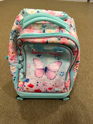 Kids Rolling Backpack with Butterfly Design - Used only few days. 50 Dh for two units