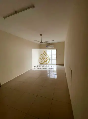 Annual rent in Ajman, Al Rawda 2 area, Sheikh Ammar Street, near Shurooq Mall. The building is for