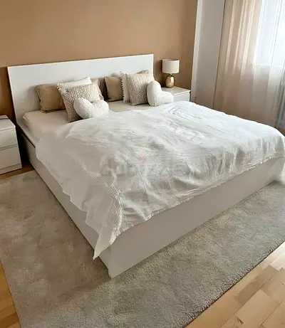 Ikea King White Malm bed frame with Ikea King mattress