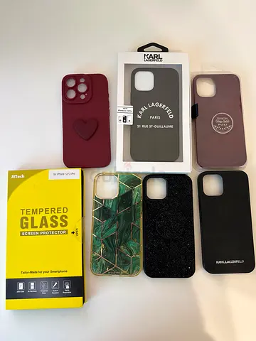 Brand New 6 Iphone 12 Pro phone cases + screen protector for 199 AED - total value is 850 AED