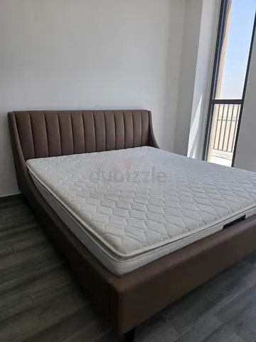Modern leather-look double bed frame with mattress - good condition Super king size