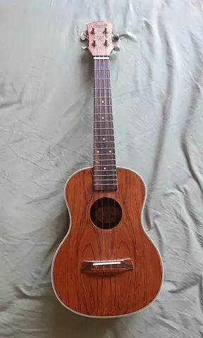 Used acoustic concert ukulele in good condition — classic wooden finish