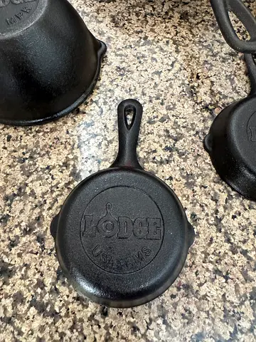 Set of small cast iron skillets / mini pans - good condition