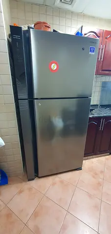 Used double-door refrigerator in good working condition