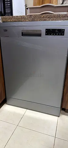 Beko freestanding stainless steel dishwasher - good condition . Pick up from business bay.