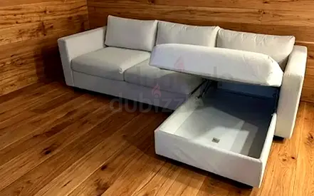Light grey 3-seater sofa with storage compartment