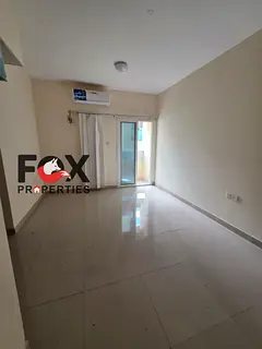 Studio for annual rent in Al Hamidiya with a semi-separate kitchen, prime location steps from Ajman