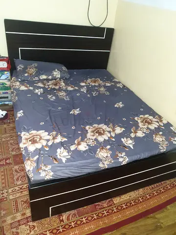 Double bed frame with headboard and mattress (used)