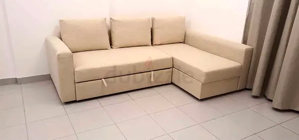 Ikea L Shape Sofa cum bed with big storage in L , and You can fix the L left and right any side