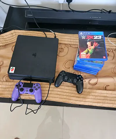 PlayStation 4 Slim with 2 Controllers and Multiple Games