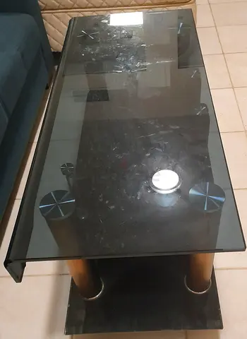 Smoked Glass Top Coffee Table with Gold Pillars