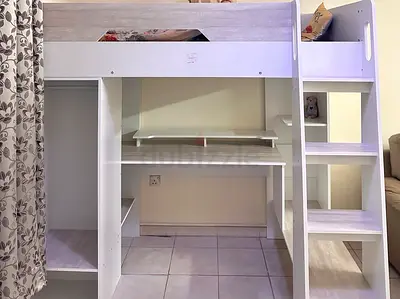 White loft bed with built-in desk and shelves — good condition