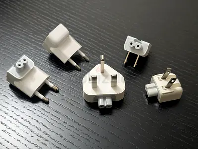 Set of international power plug adapters (UK, EU, US) - white, used