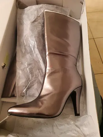 Pair of metallic silver knee-high stiletto boots, 38 size, once use only