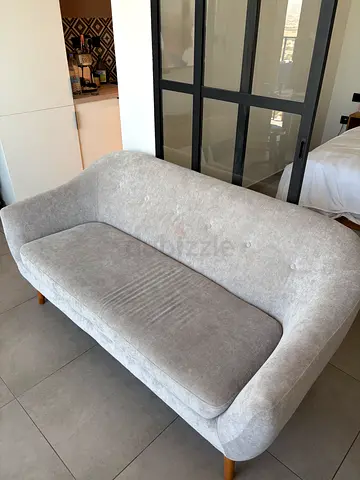 Light grey 2-seater sofa in great condition.