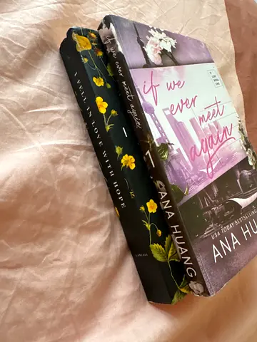 Two paperback romance novels by Ana Huang - gently used