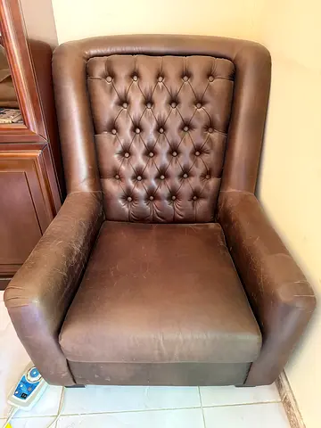 Brown tufted leather armchair - single seat