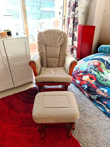 Rocking Chair with Matching Ottoman for sale.