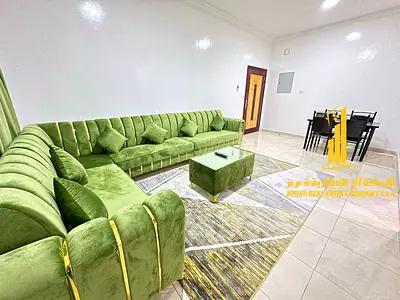 For monthly rent in Ajman, two-bedroom apartment with a balcony open view, fully furnished with ele
