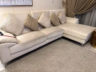 Light beige L-shaped leather sofa from Home Centre with chaise, excellent condition
