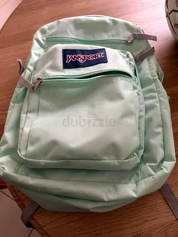 Mint green JanSport backpack – good condition, roomy everyday bag