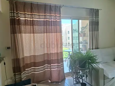 2 SETS OF CURTAINS AND RODS