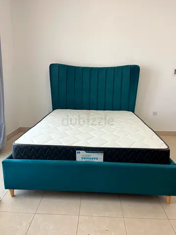 Upholstered bed and mattress