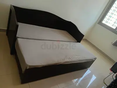 Sofa cum bed with storage space , brown color  never used.