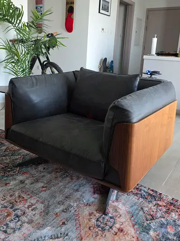 Modern leather armchair with wooden shell - single seat