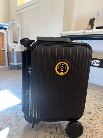 2 x Airwheel - Electric Travel Suitcase - Black  Silver - 1500 AED a piece or the pair for 2500